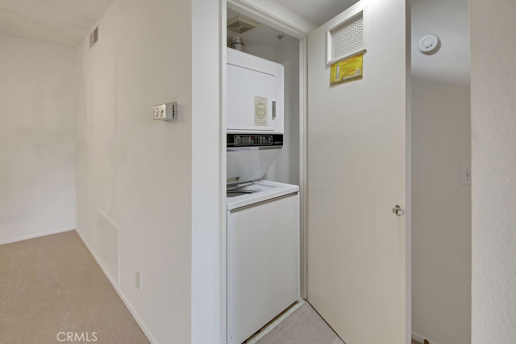 2800 Keller Drive, Unit 282 Tustin, CA 92782 - Photo 16 of 19 a room with a washer and dryer