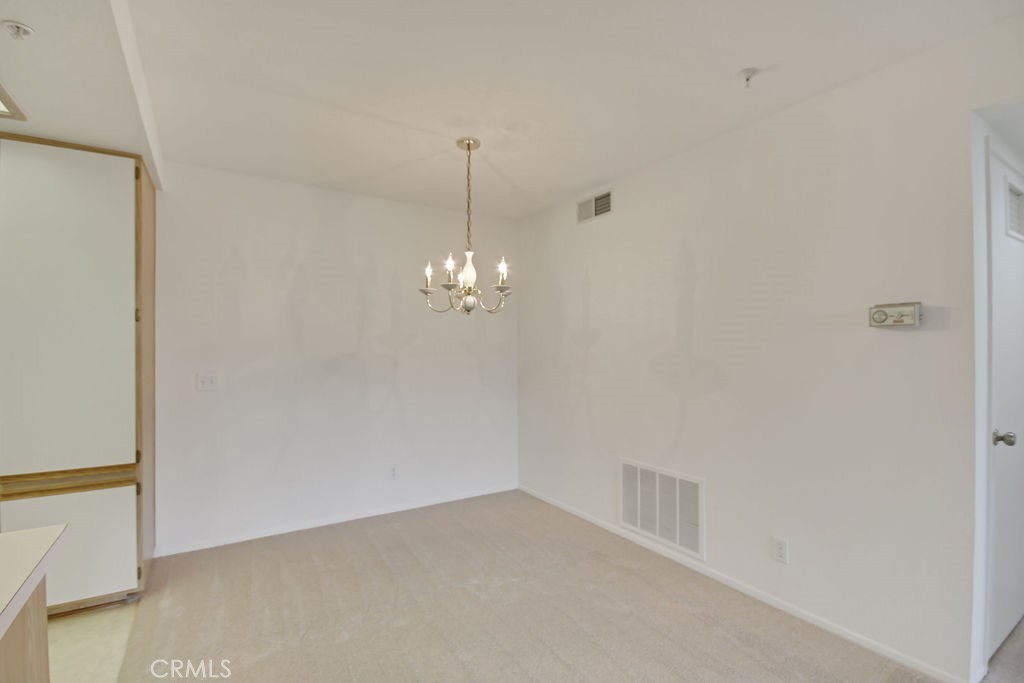 2800 Keller Drive, Unit 282 Tustin, CA 92782 - Photo 7 of 19 a view of empty room with wooden floor