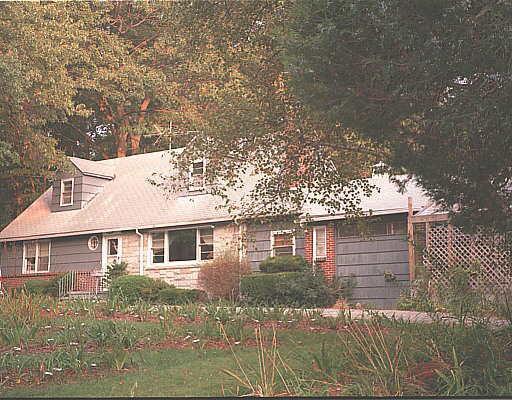 93 Strobel Road Trumbull, CT 06611 - Photo 1 of 1 a front view of a house with a yard