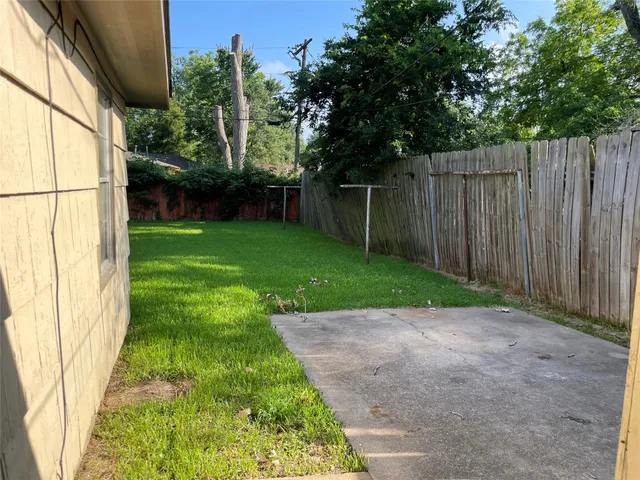 a view of backyard with green space