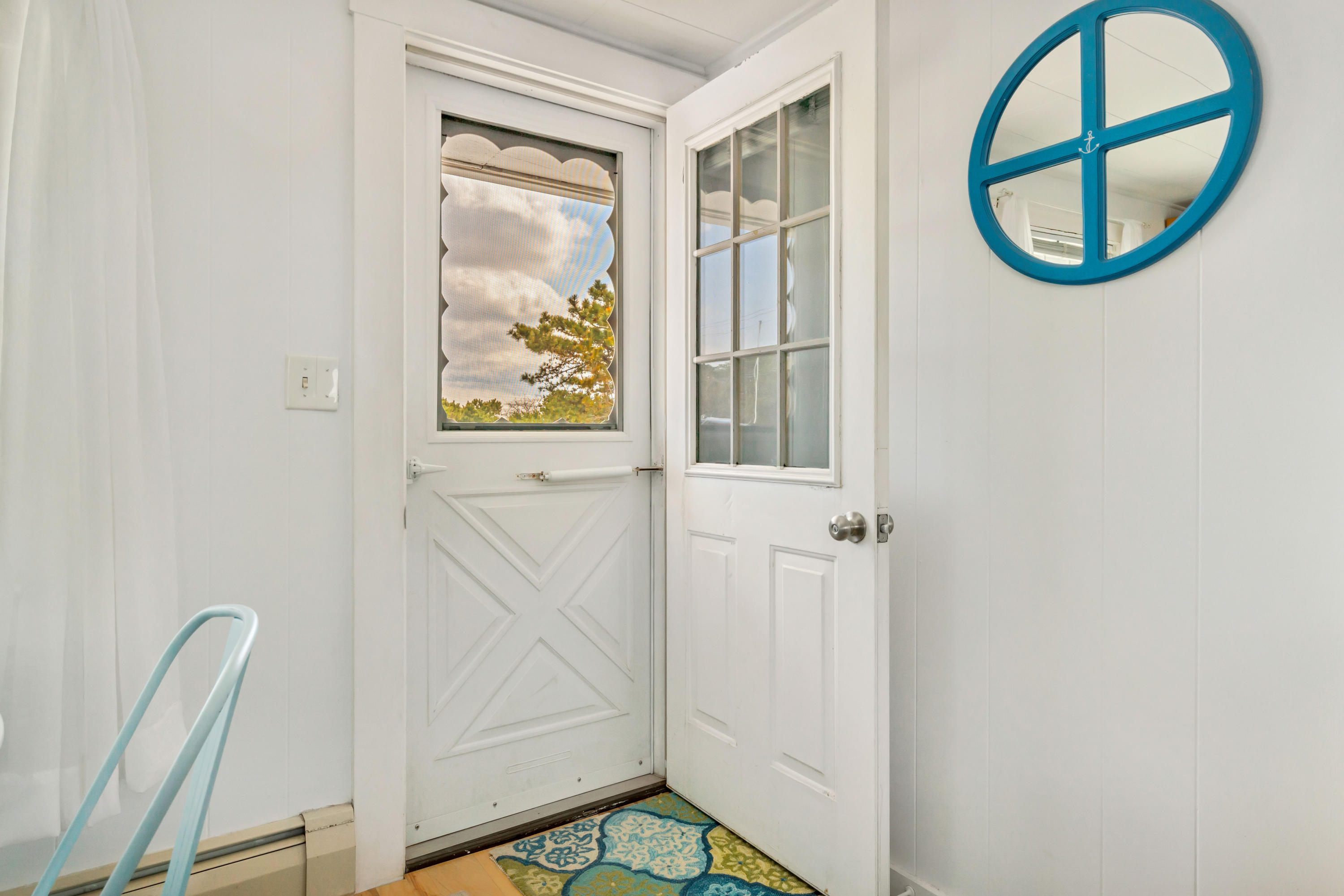 148 Shore Road, Unit 2 Truro, MA 02666 - Photo 3 of 16 a view of a door in a room