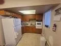 a kitchen with a refrigerator