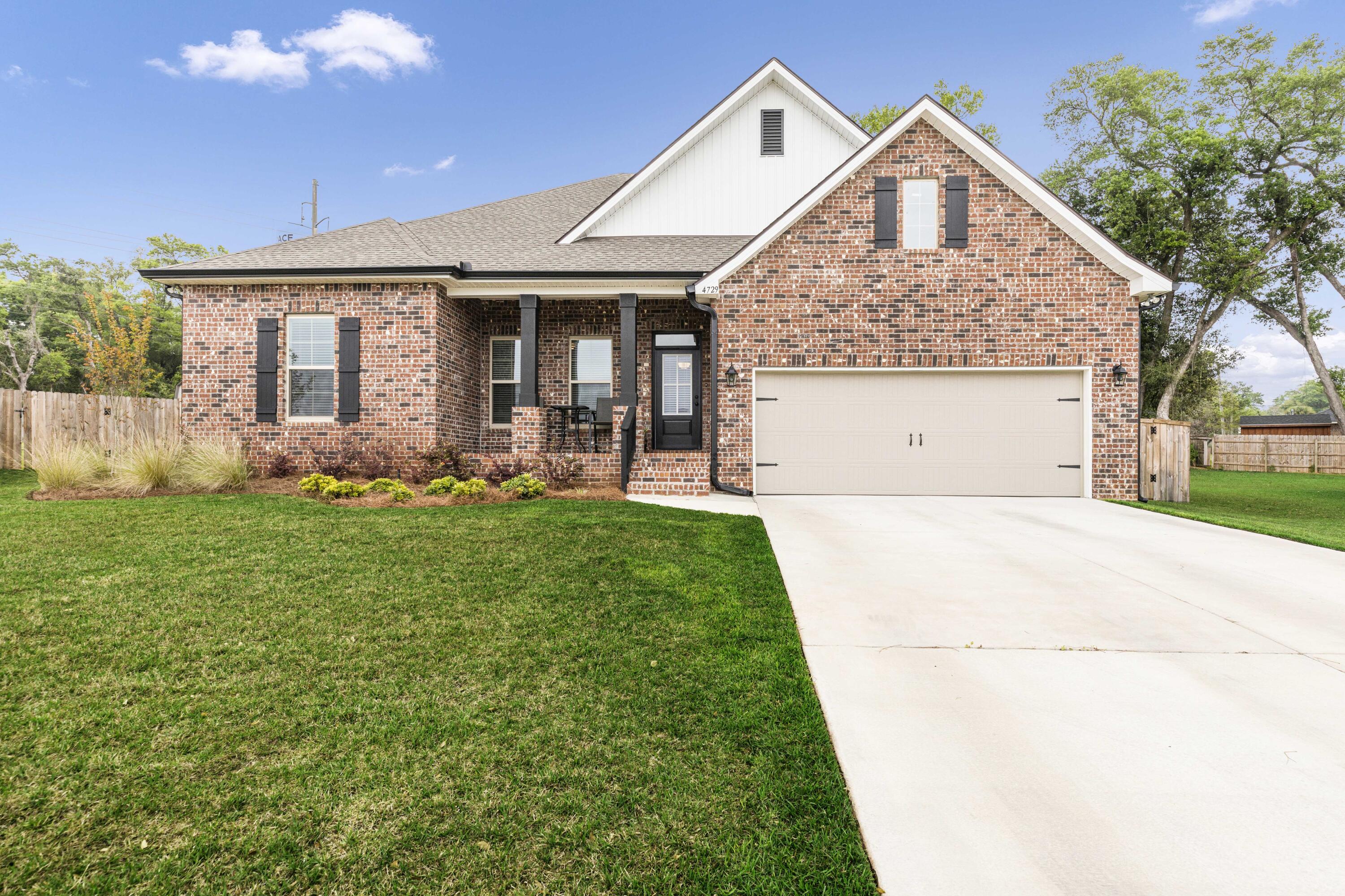 a view of a house with garden