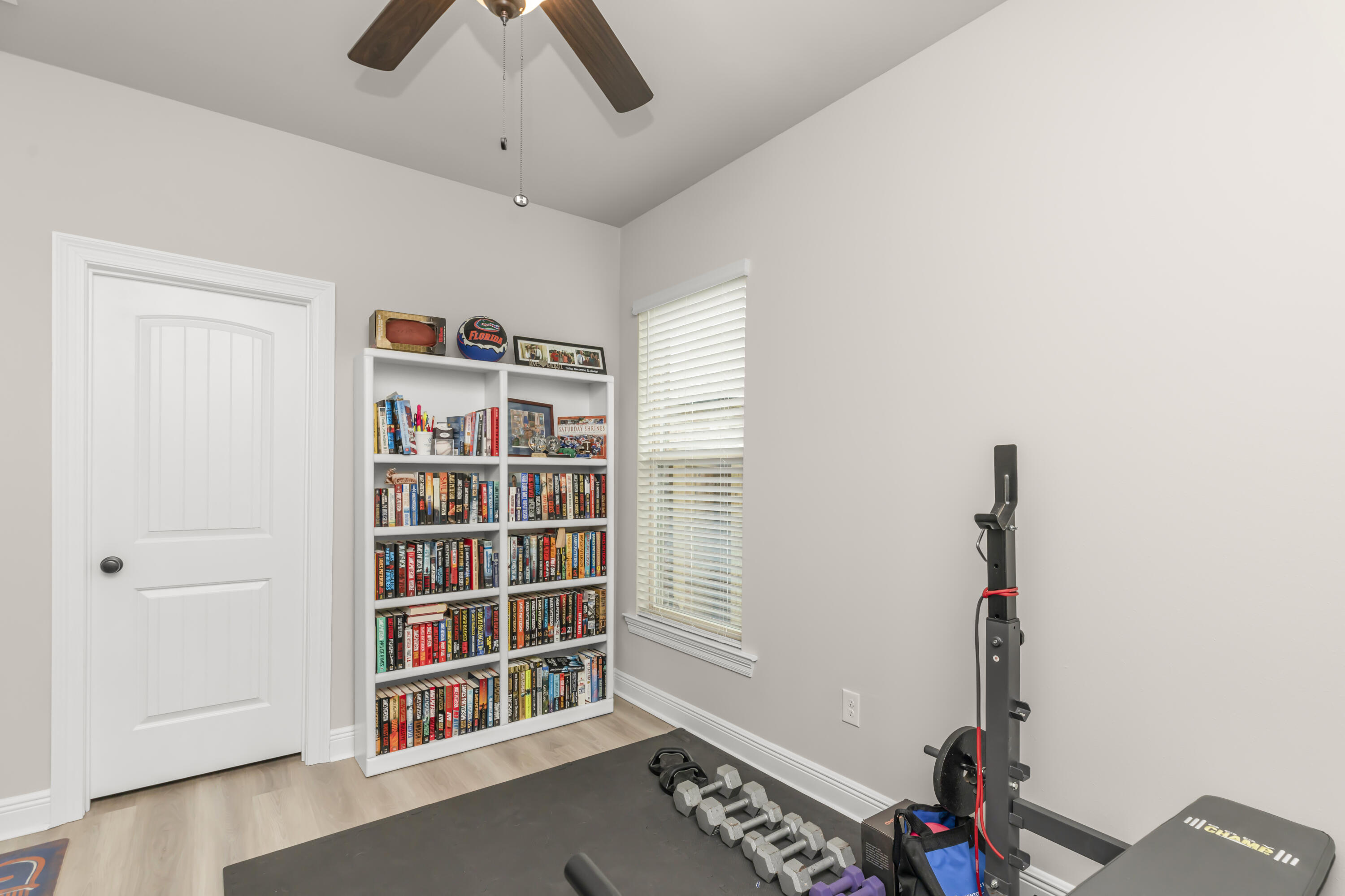 4729 Sago Palm Circle Pace, FL 32571 - Photo 15 of 29 a workspace with furniture and closet