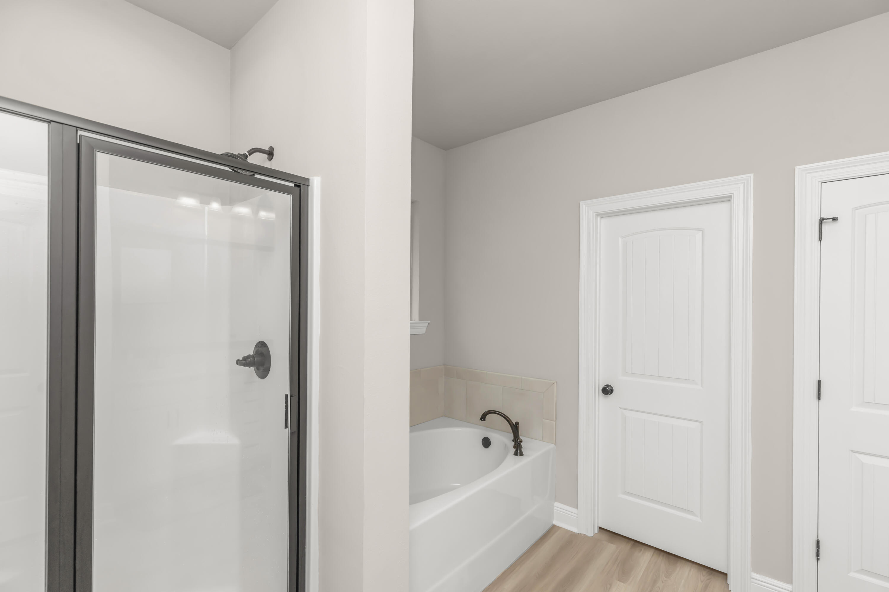 4729 Sago Palm Circle Pace, FL 32571 - Photo 21 of 29 a bathroom with a bathtub and a shower