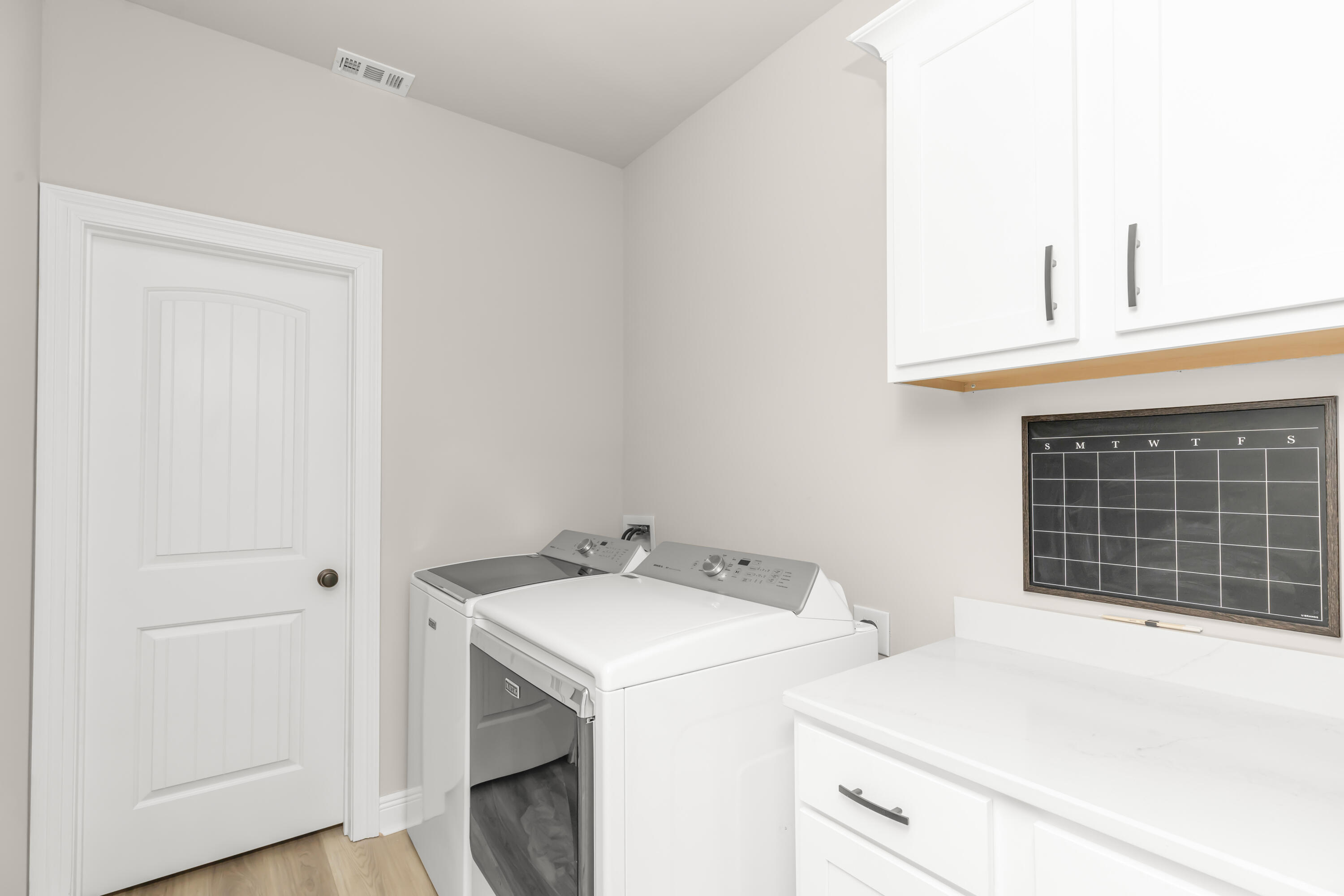 4729 Sago Palm Circle Pace, FL 32571 - Photo 22 of 29 a utility room with dryer and washer