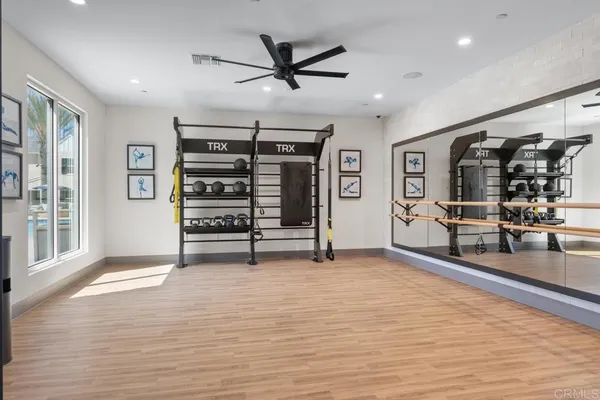 a kitchen with stainless steel appliances granite countertop a refrigerator sink and stove