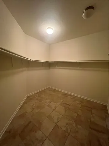 a view of a room with an empty space