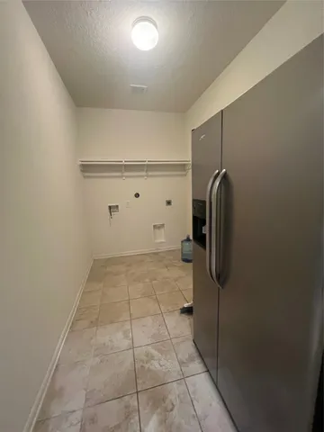 a view of a storage & utility room with washer and dryer