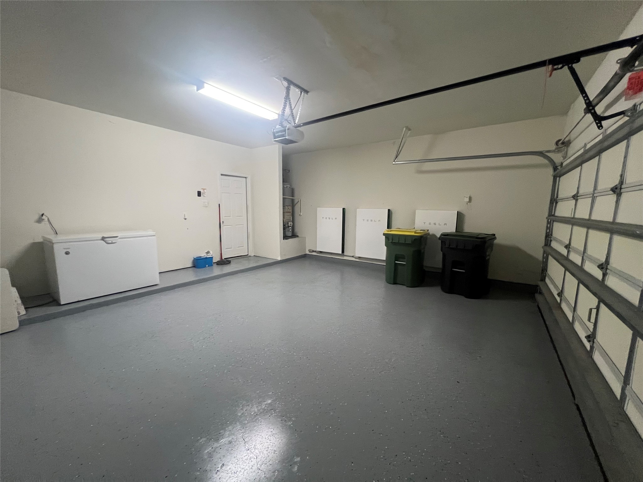 14112 Harmony Ridge Trail Pearland, TX 77584 - Photo 21 of 45 a view of storage and utility room with stairs and wooden floor