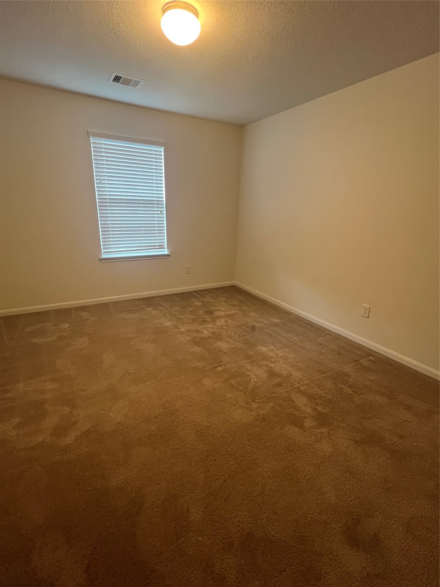 14112 Harmony Ridge Trail Pearland, TX 77584 - Photo 33 of 45 a view of an empty room