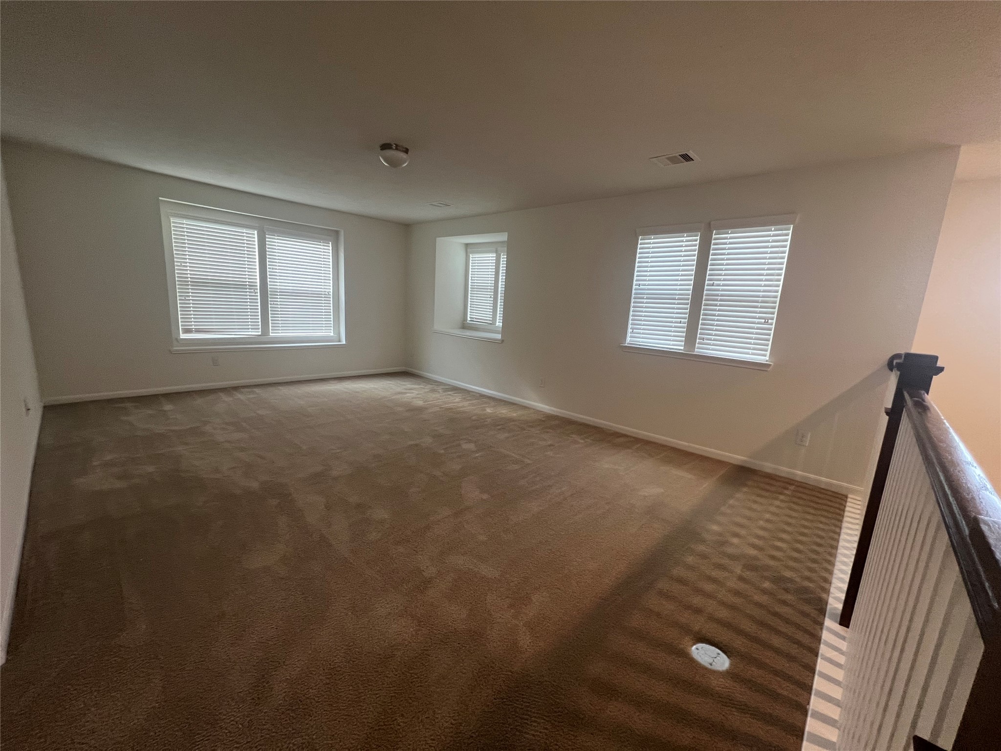 14112 Harmony Ridge Trail Pearland, TX 77584 - Photo 40 of 45 a view of an empty room with a window