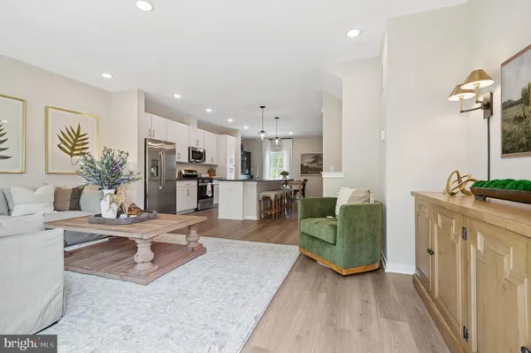 a living room with furniture and a table
