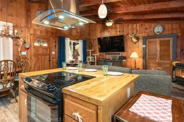 a kitchen with a stove and a microwave