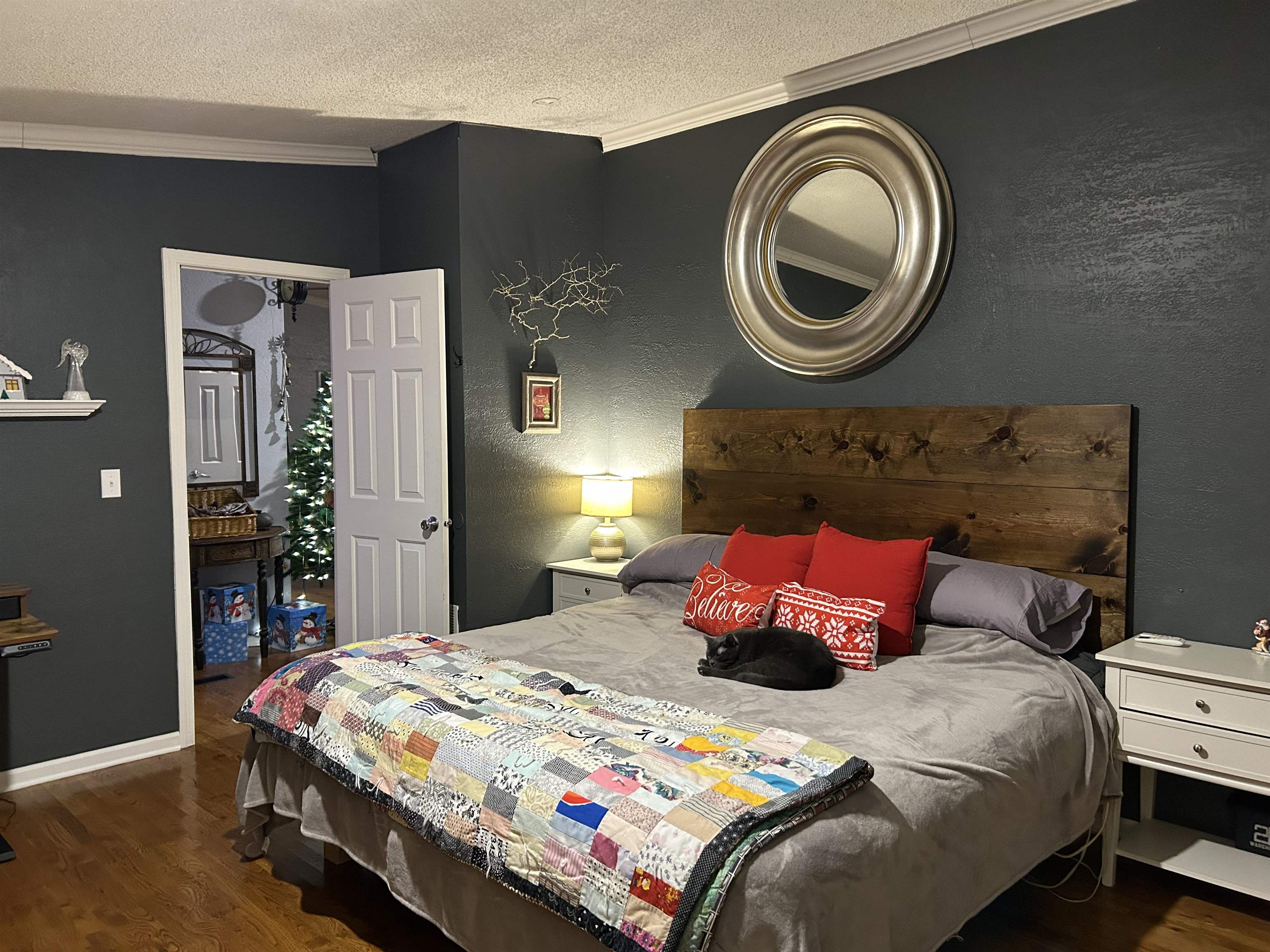 885 Highway 138 Toone, TN 38381 - Photo 18 of 25 a bedroom with a bed and a lamp