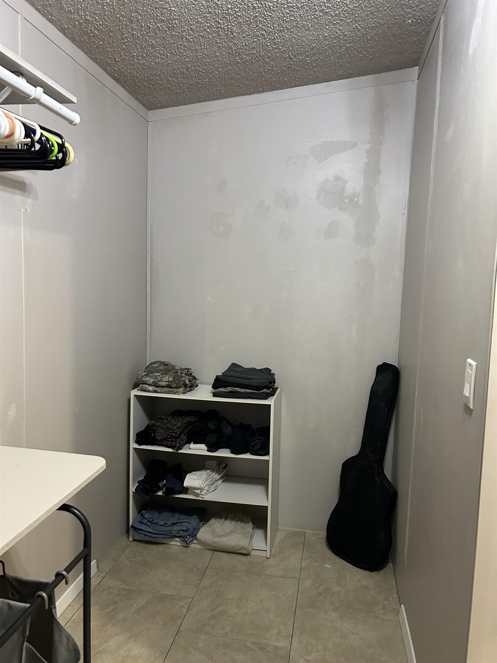 885 Highway 138 Toone, TN 38381 - Photo 23 of 25 a room with a chair and a wooden floor