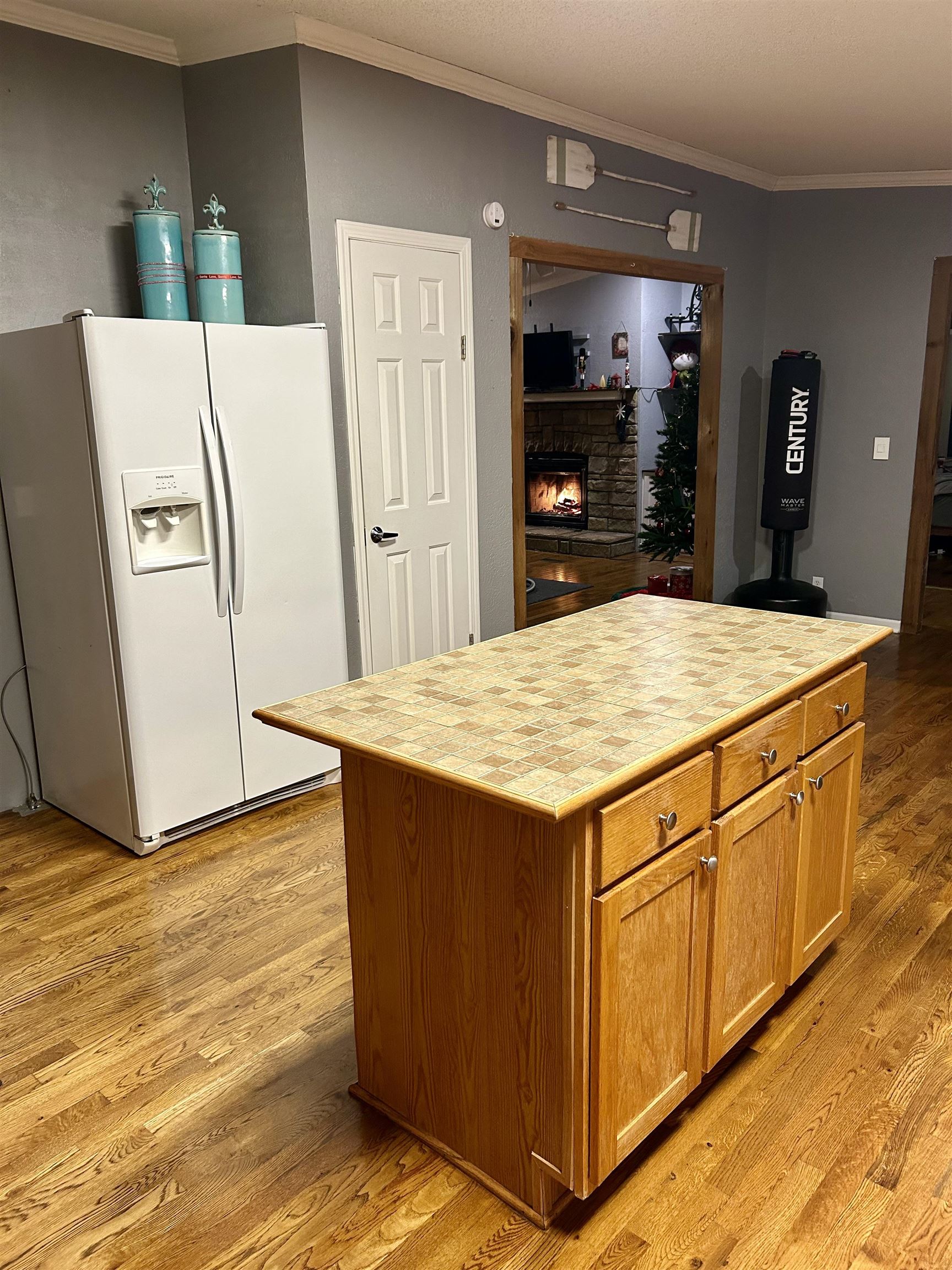 885 Highway 138 Toone, TN 38381 - Photo 8 of 25 a kitchen with stainless steel appliances kitchen island a refrigerator sink and stove