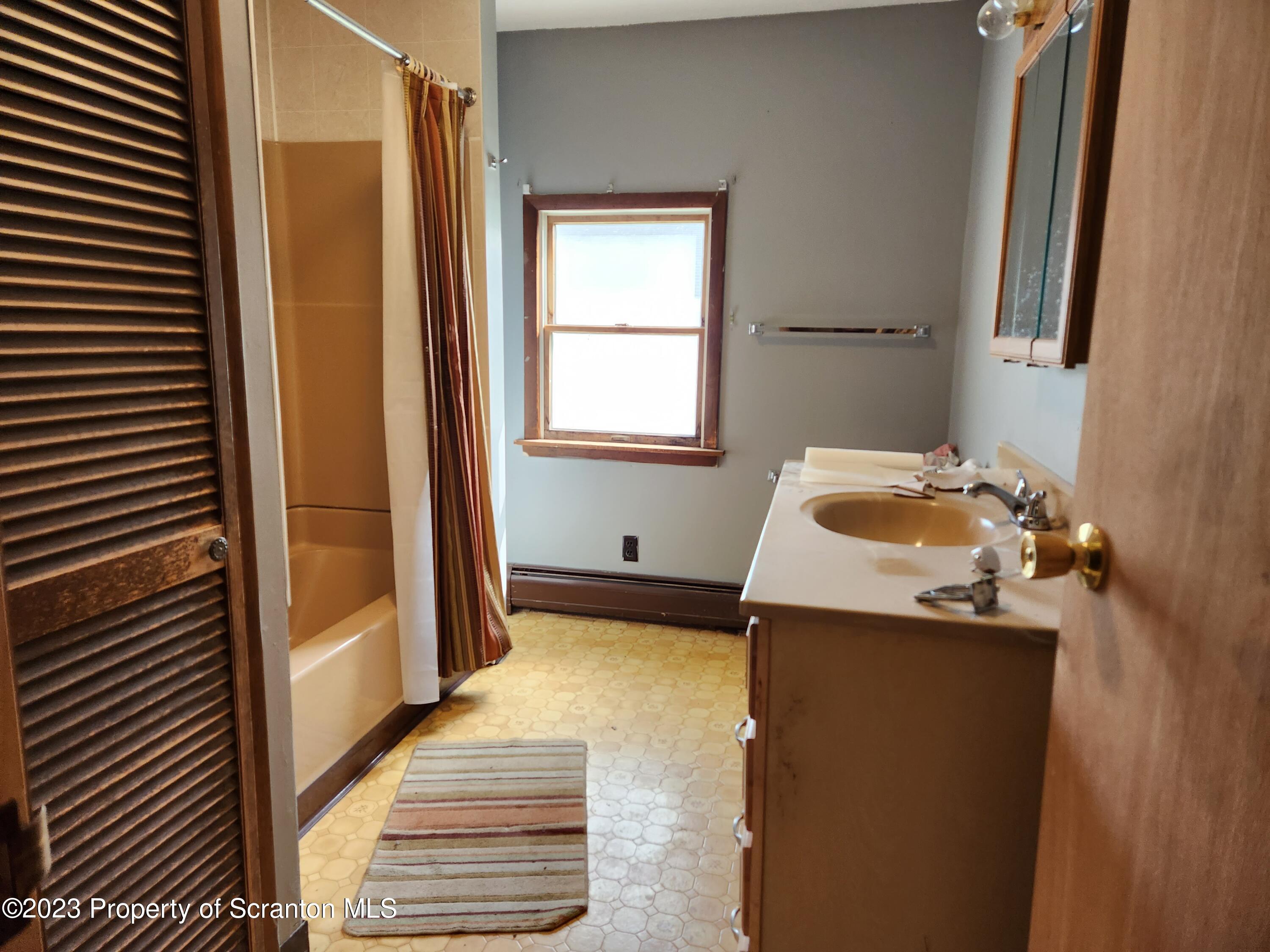 18775 Rte 187 Towanda Pa Towanda, PA 18848 - Photo 10 of 22 a bathroom with a sink and a mirror