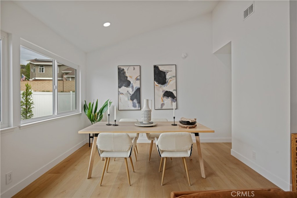 2108 Ardenwood Avenue Simi Valley, CA 93063 - Photo 11 of 33 a dining room with furniture and window