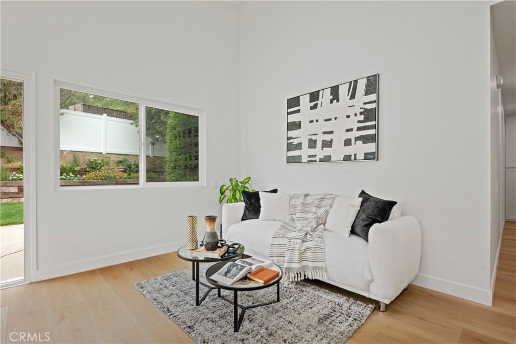 2108 Ardenwood Avenue Simi Valley, CA 93063 - Photo 19 of 33 a living room with furniture and a window