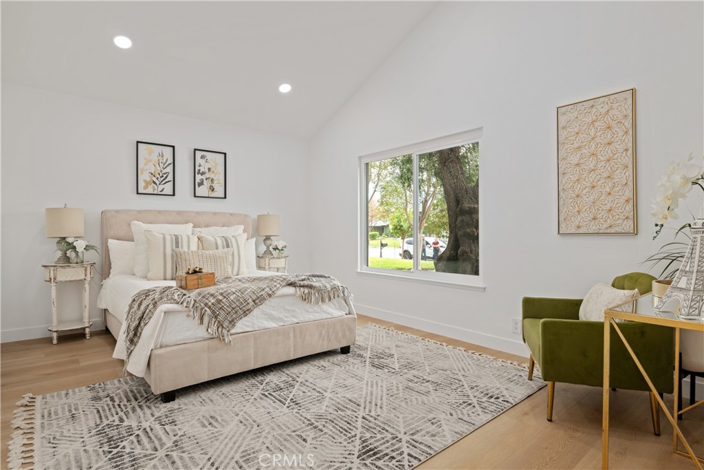 2108 Ardenwood Avenue Simi Valley, CA 93063 - Photo 20 of 33 a bedroom with a bed a table and chair