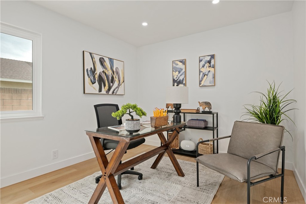 2108 Ardenwood Avenue Simi Valley, CA 93063 - Photo 27 of 33 a dining room with furniture and wooden floor