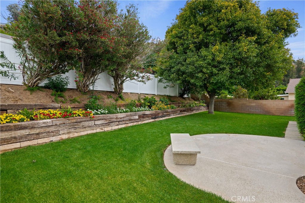 2108 Ardenwood Avenue Simi Valley, CA 93063 - Photo 31 of 33 a view of a garden with trees