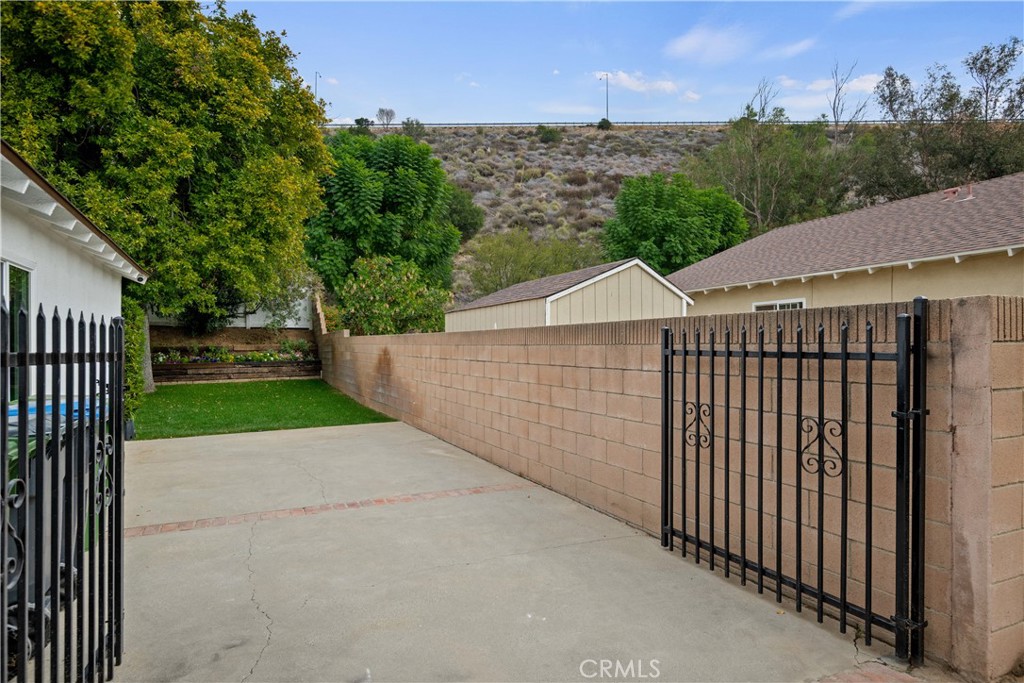 2108 Ardenwood Avenue Simi Valley, CA 93063 - Photo 33 of 33 a view of a backyard and a garden