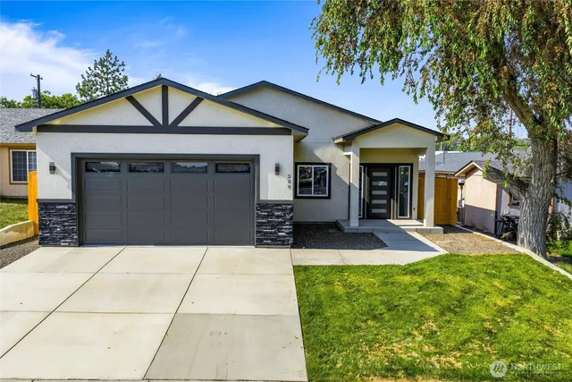 a front view of a house with yard