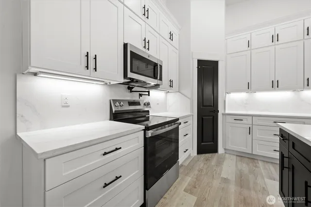 a view of a kitchen with a sink