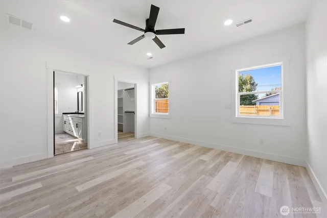 a bathroom with a shower and a sink