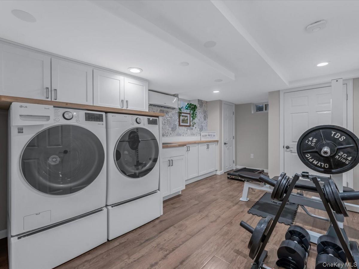 1896 Russell Street Bellmore, NY 11710 - Photo 19 of 21 a view of a storage & utility room with washer and dryer