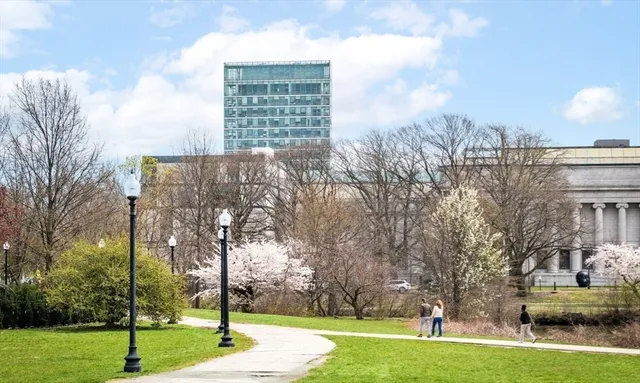 a view of a city with tall buildings