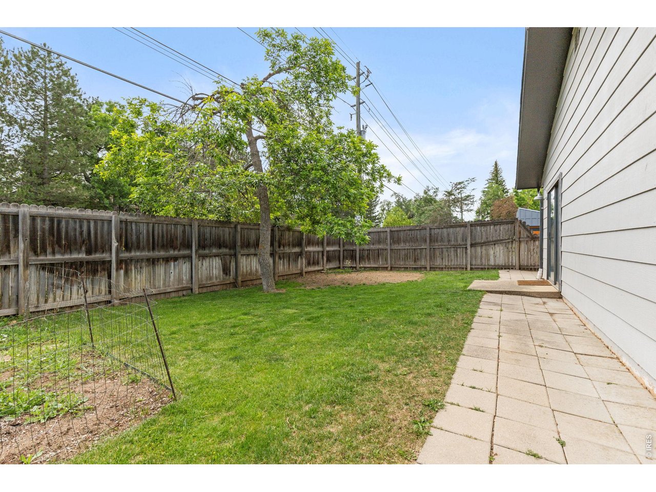 3565 19th Street Boulder, CO 80304 - Photo 29 of 37 EAST SIDE OF YARD WITH GARDEN BEDS