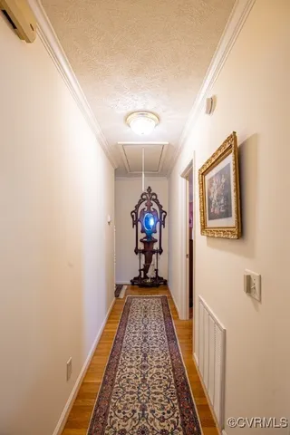 a bedroom with furniture and a chandelier