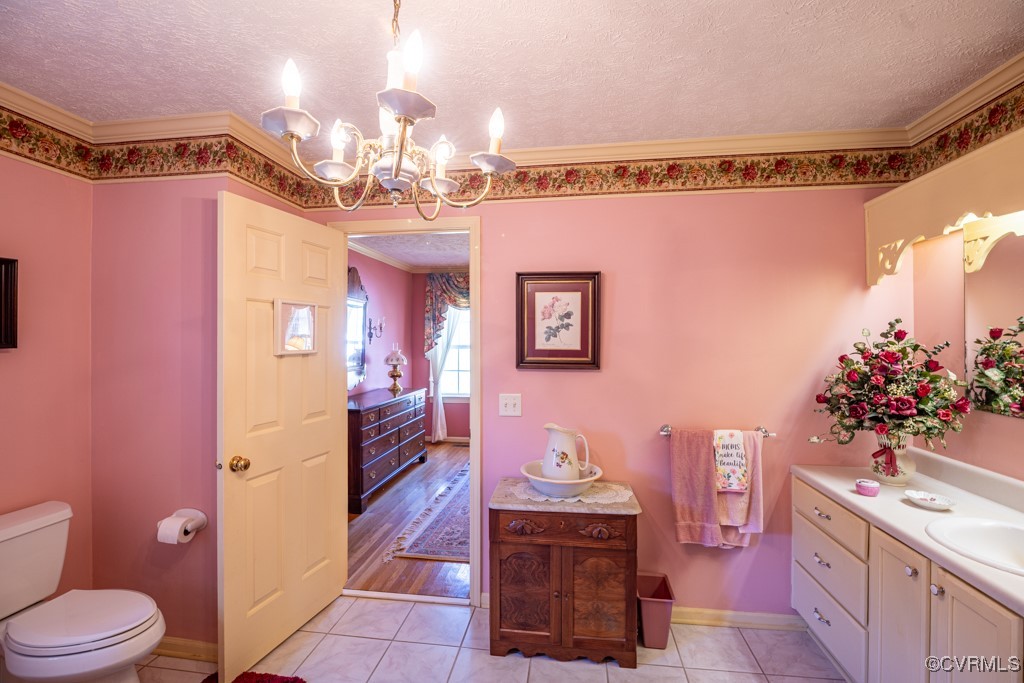 1416 Snead Spring Road Crewe, VA 23930 - Photo 22 of 35 a bathroom with a sink a vanity and a mirror