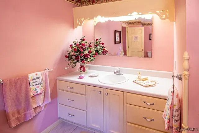 a bathroom with a sink and toilet