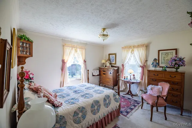a bathroom with a sink mirror vanity and toilet