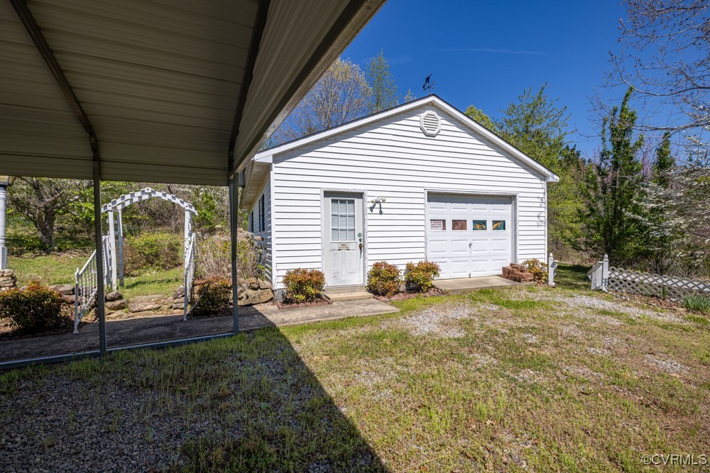 1416 Snead Spring Road Crewe, VA 23930 - Photo 33 of 35 a view of a house with backyard and sitting area