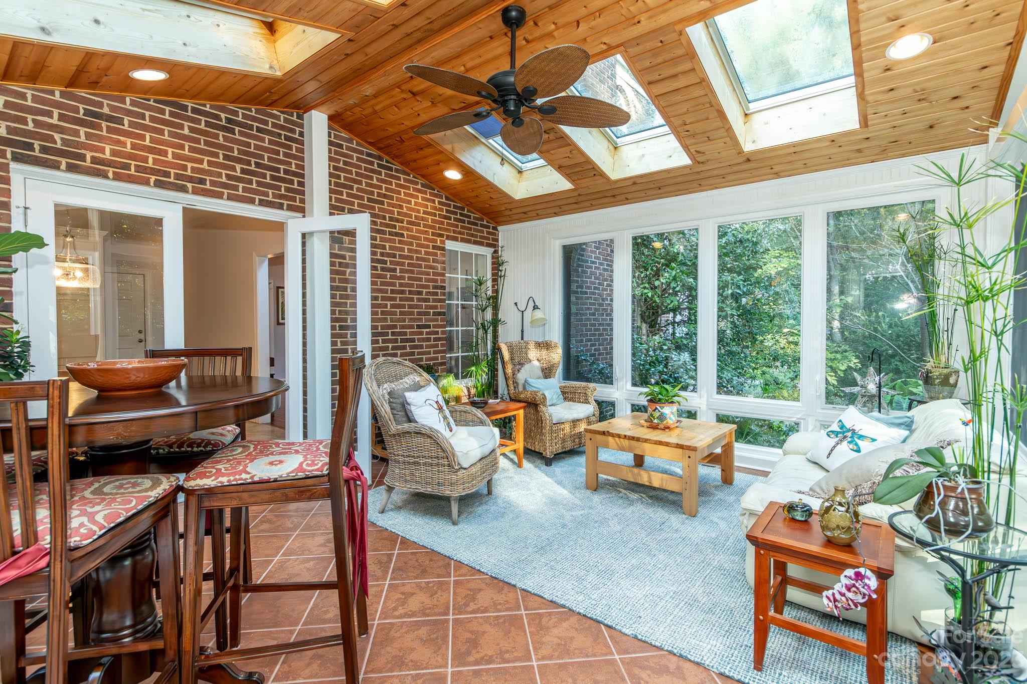 10507 Rougemont Lane Charlotte, NC 28277 - Photo 27 of 48 a reading room with furniture and large windows