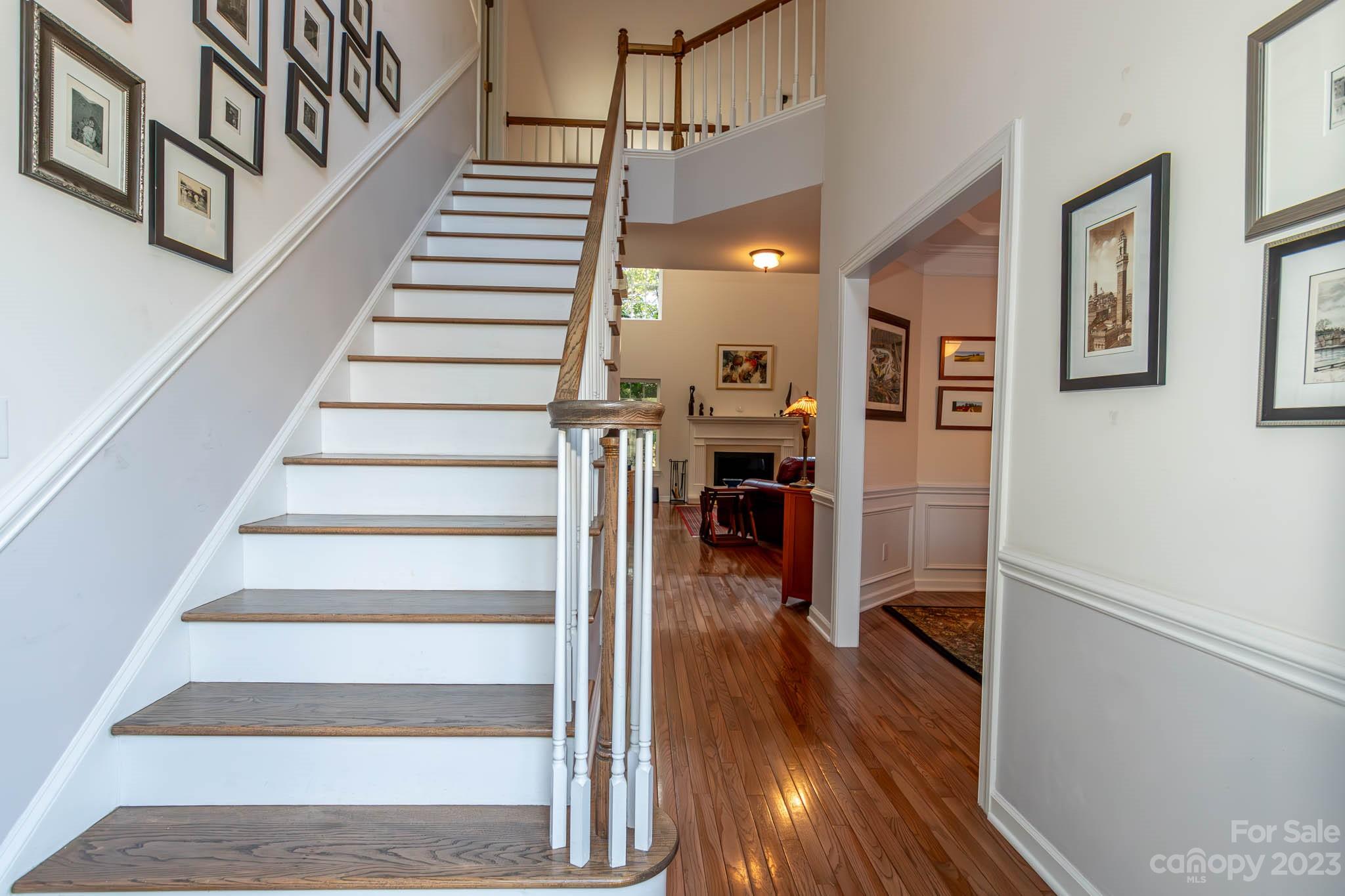 10507 Rougemont Lane Charlotte, NC 28277 - Photo 35 of 48 a view of entryway and hall with wooden floor