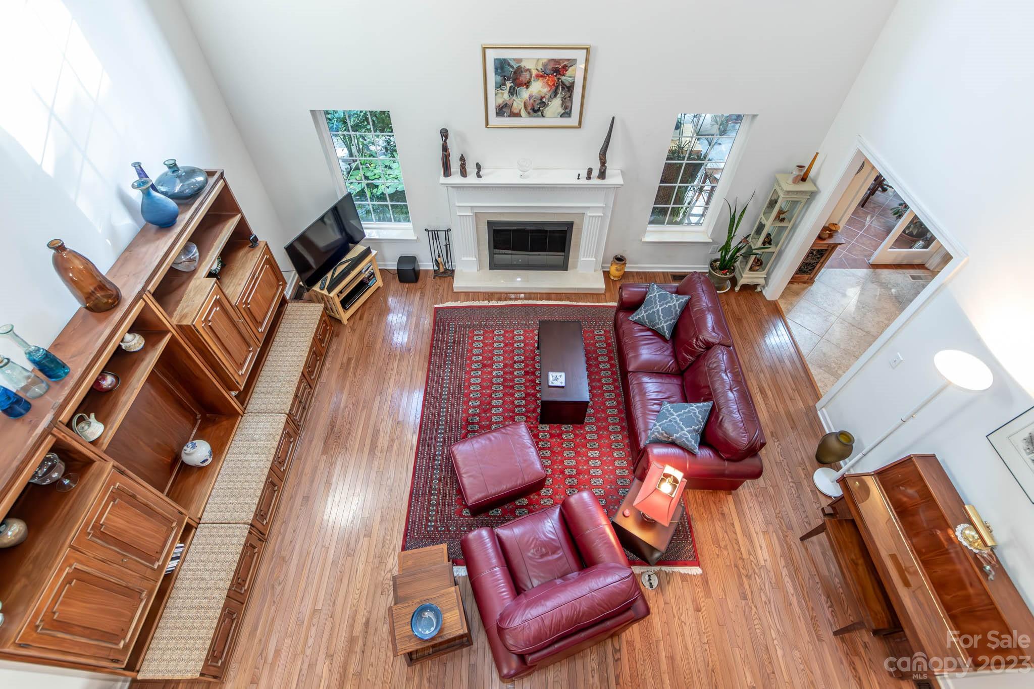10507 Rougemont Lane Charlotte, NC 28277 - Photo 36 of 48 a living room with furniture and a fireplace