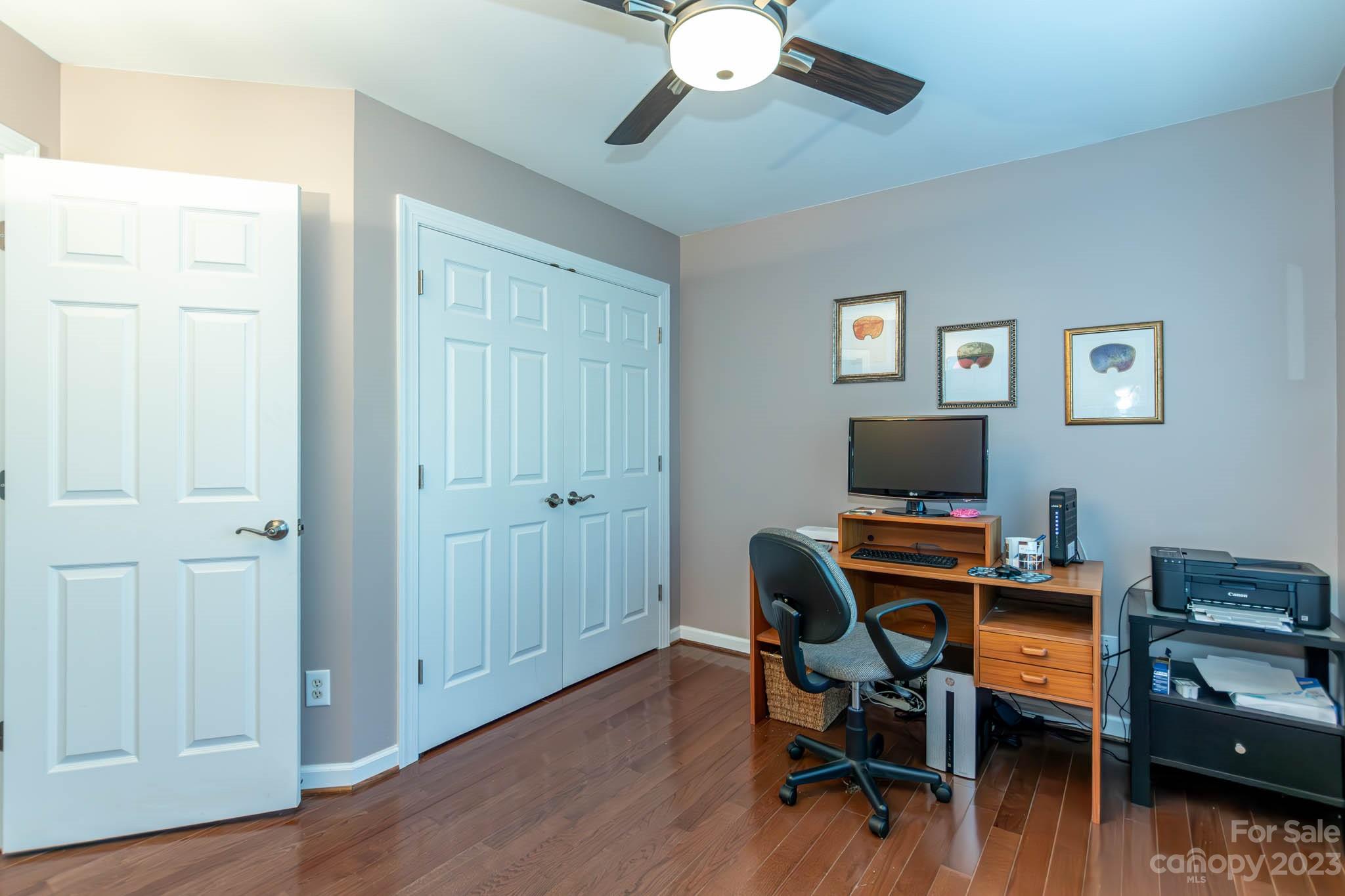 10507 Rougemont Lane Charlotte, NC 28277 - Photo 41 of 48 a view of a workspace with furniture and wooden floor