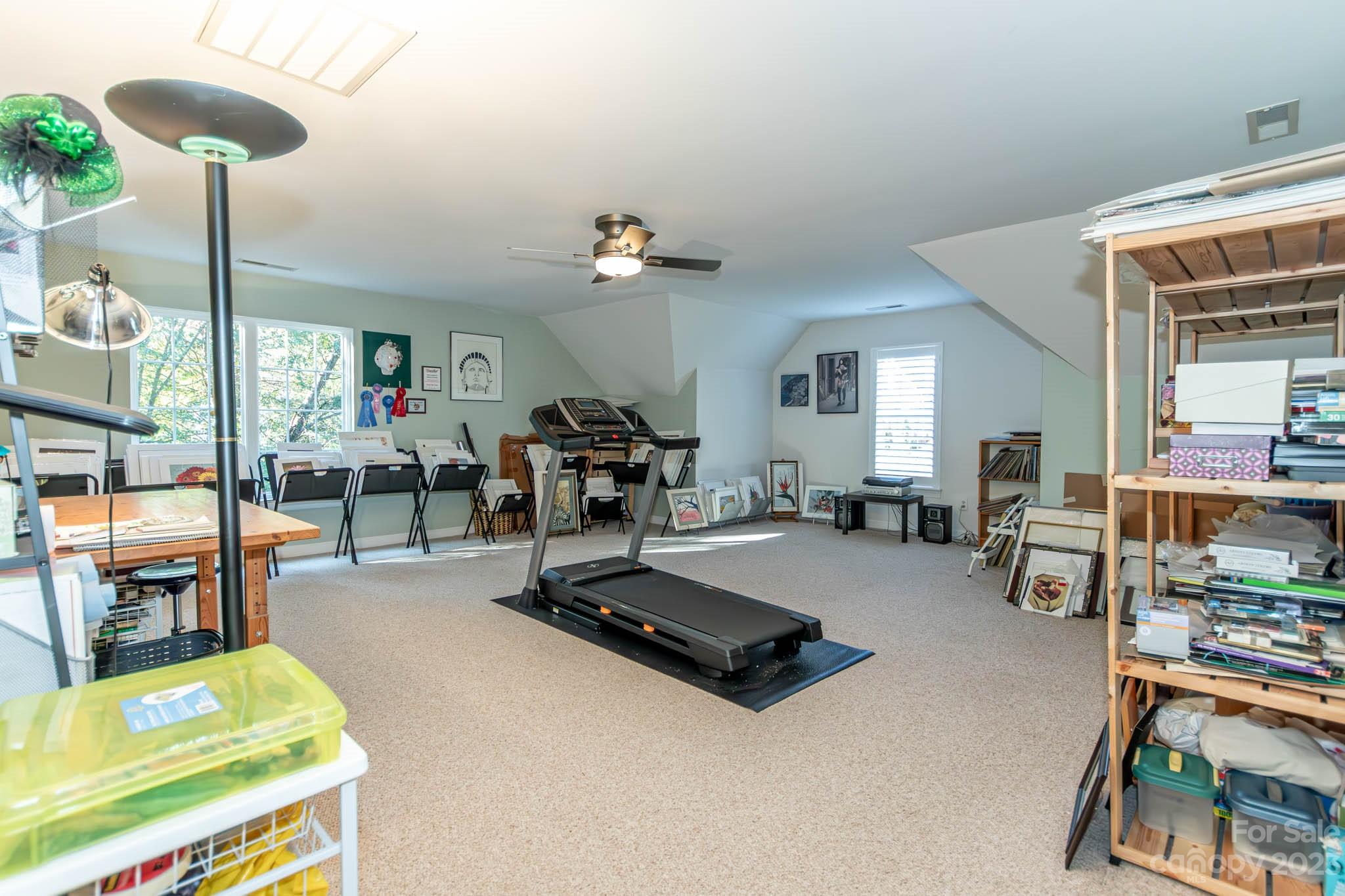 10507 Rougemont Lane Charlotte, NC 28277 - Photo 42 of 48 a room with furniture gym equipment and a table