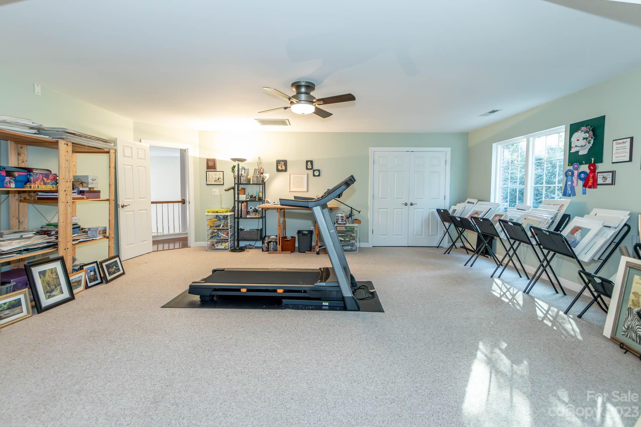 10507 Rougemont Lane Charlotte, NC 28277 - Photo 44 of 48 a bedroom with furniture and a chandelier