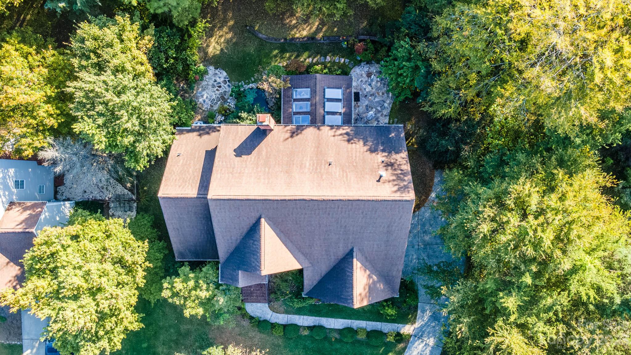 10507 Rougemont Lane Charlotte, NC 28277 - Photo 10 of 48 a view of a house with a yard and sitting area