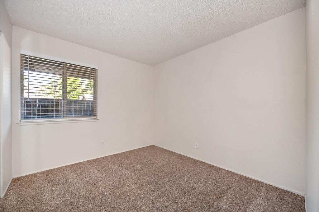 9160 Madison Avenue, Unit 57 Fair Oaks, CA 95628 - Photo 22 of 40 a view of an empty room with a window