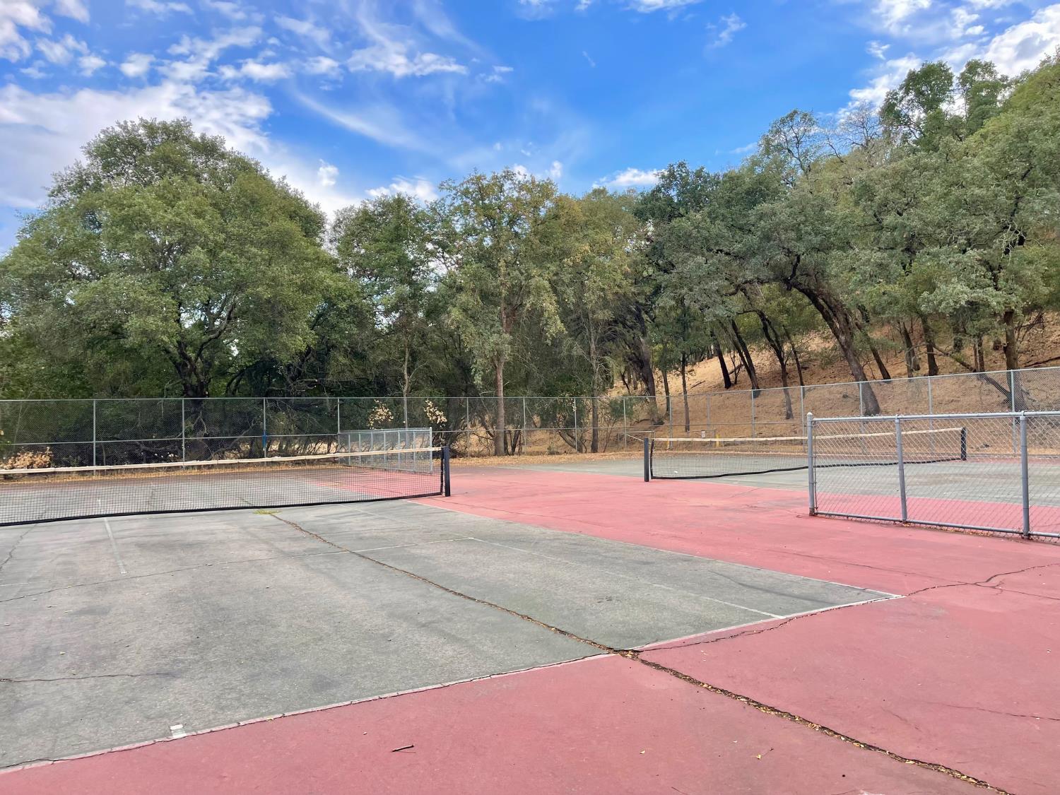 9160 Madison Avenue, Unit 57 Fair Oaks, CA 95628 - Photo 33 of 40 a view of lawn tennis court