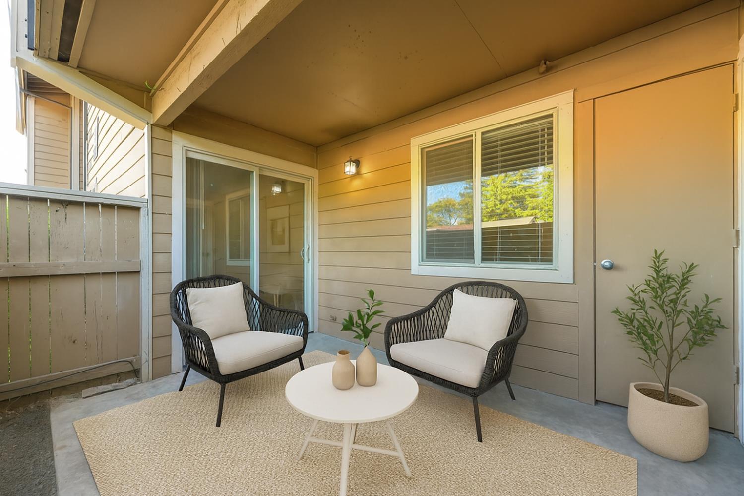 9160 Madison Avenue, Unit 57 Fair Oaks, CA 95628 - Photo 5 of 40 a living room with furniture and a potted plant
