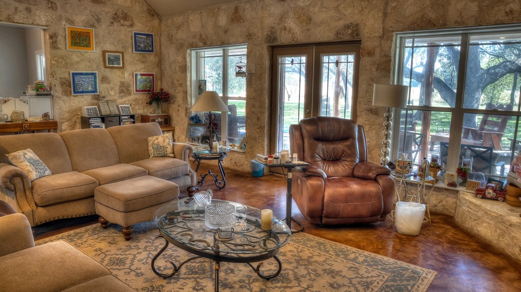 4573 Ranch Road 1120 Rio Frio, TX 78879 - Photo 24 of 71 a living room with furniture and a large window